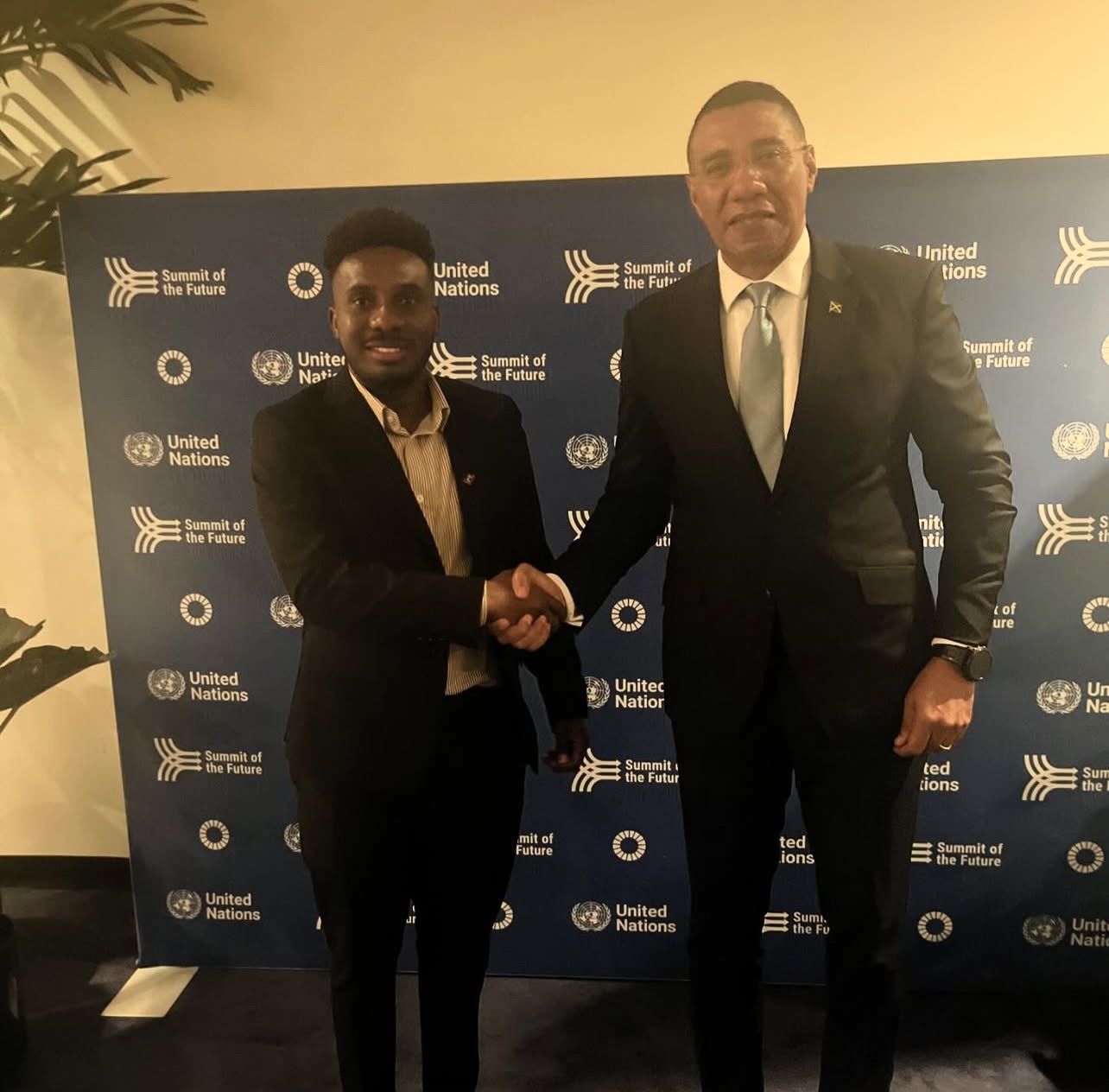 Christopher J. Massenat, Managing Director for the Americas, with the Hon. Andrew Holness, Prime Minister of Jamaica.